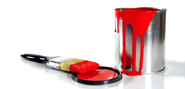 red paint bucket and brush