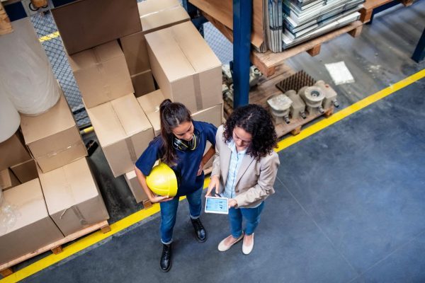 supply-chain-women-warehouse-ipad