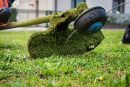 Grass cutter / brush cutter for trimming overgrown grass