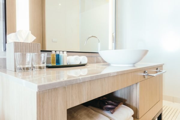 Beautiful luxury sink decoration in bathroom interior for background - Vintage Light filter